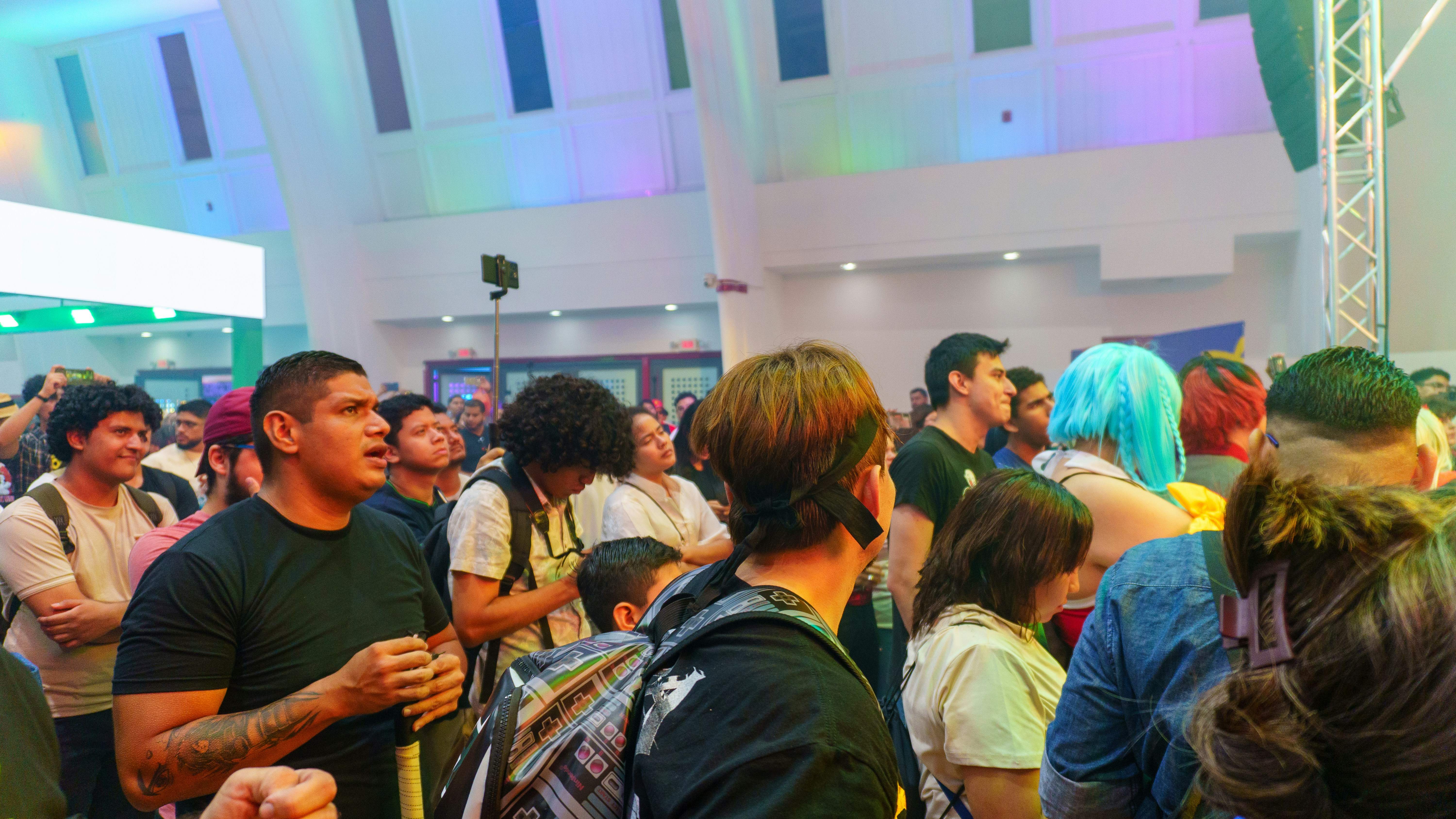 Crowd of people looking up at an event