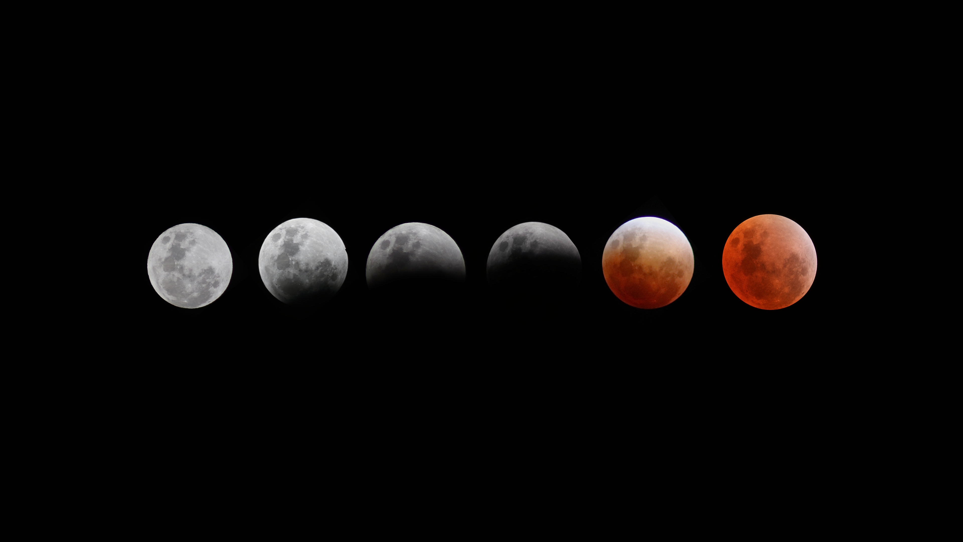 Stages of a lunar eclipse on black background