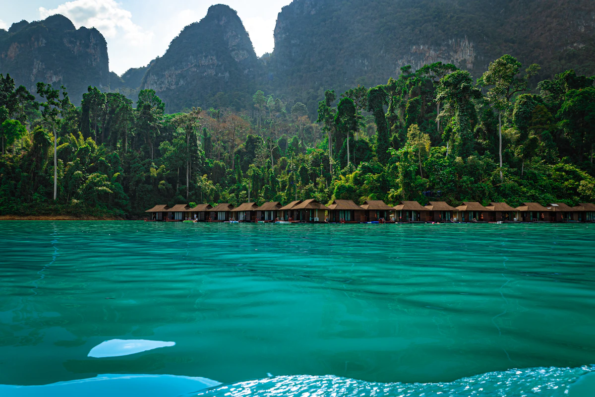 Overwater bungalows on tropical shoreline