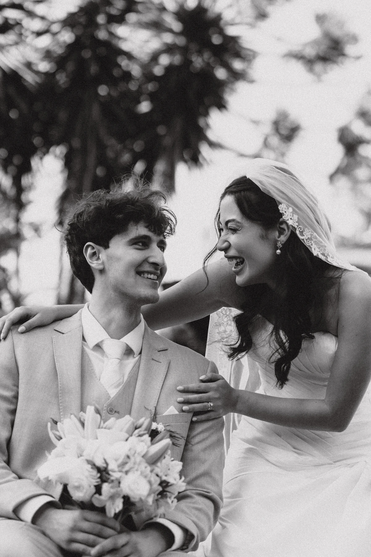 Newlyweds laughing together