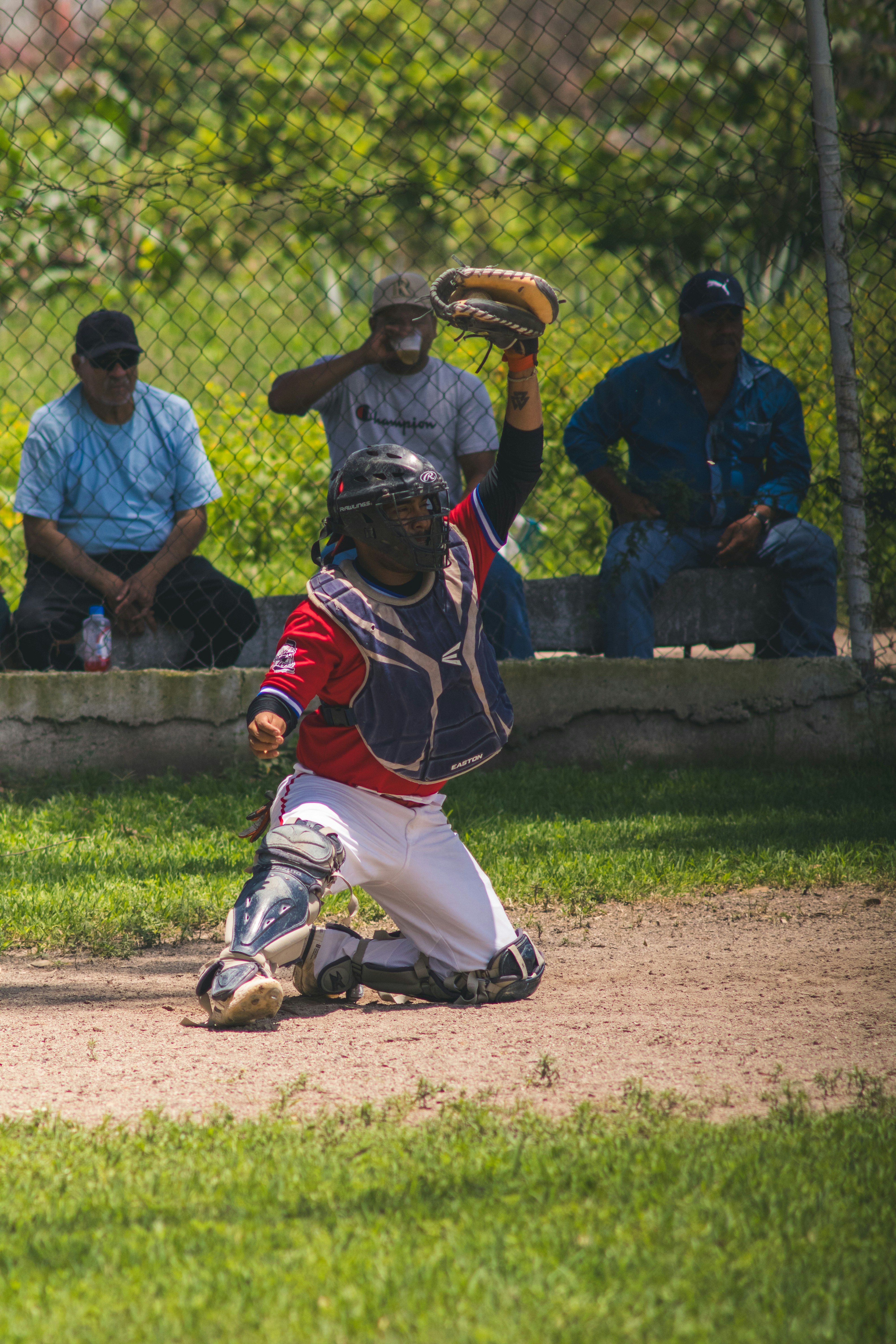 Baseball catcher in full gear in a game