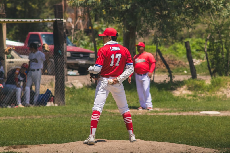 baseball pitcher, pitching mound, baseball stadium, pitcher glove, scoreboard