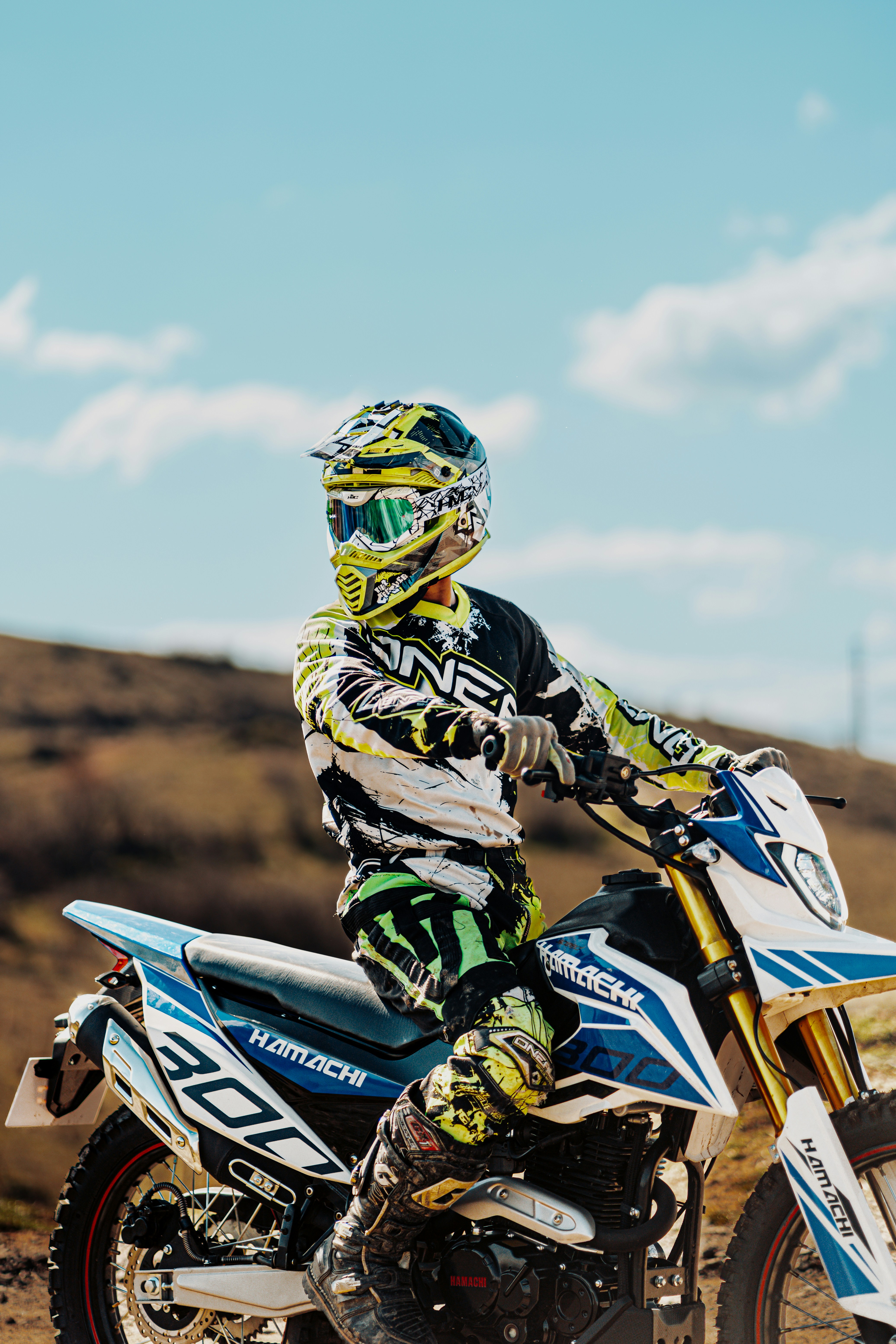 Man in motocross gear on a dirt bike