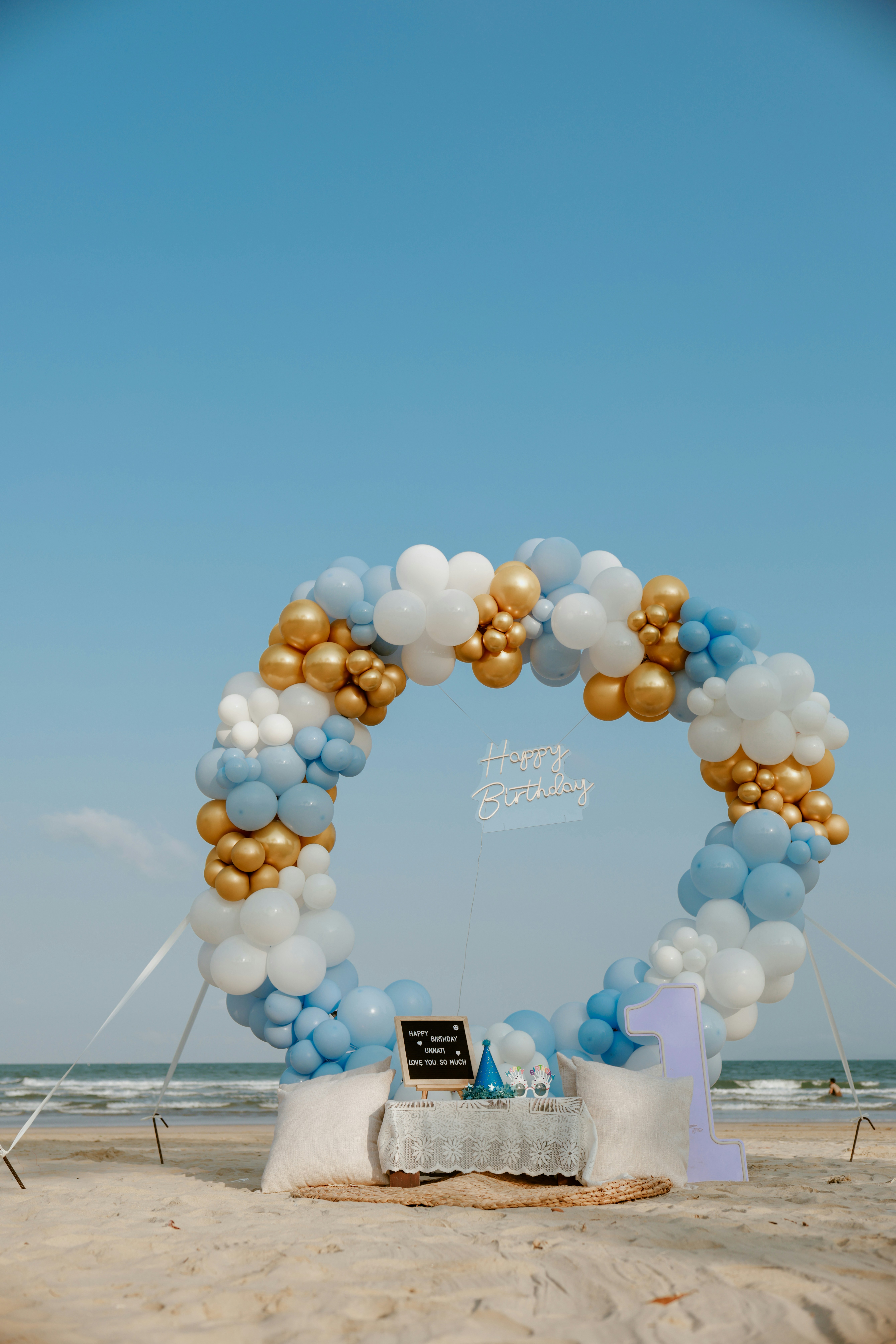 Beach setup for a child's first birthday celebration
