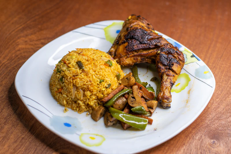 Grilled chicken with rice and stir-fried vegetables