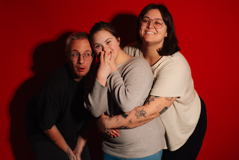 Three friends, BBW and admirers, embracing