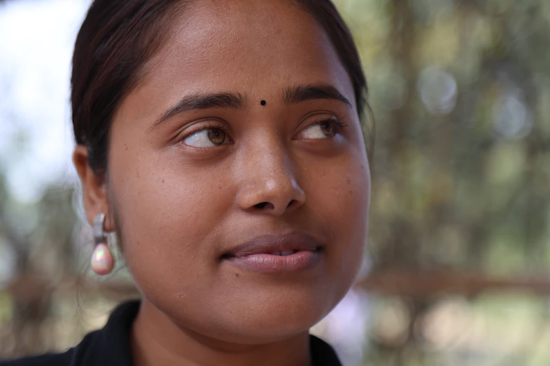 young Indian woman with brown eyes and a bindi