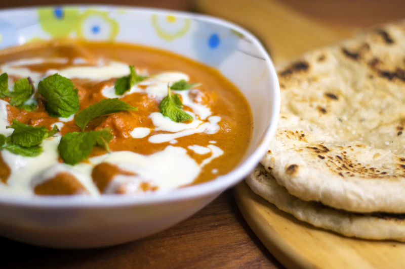Butter chicken curry with naan