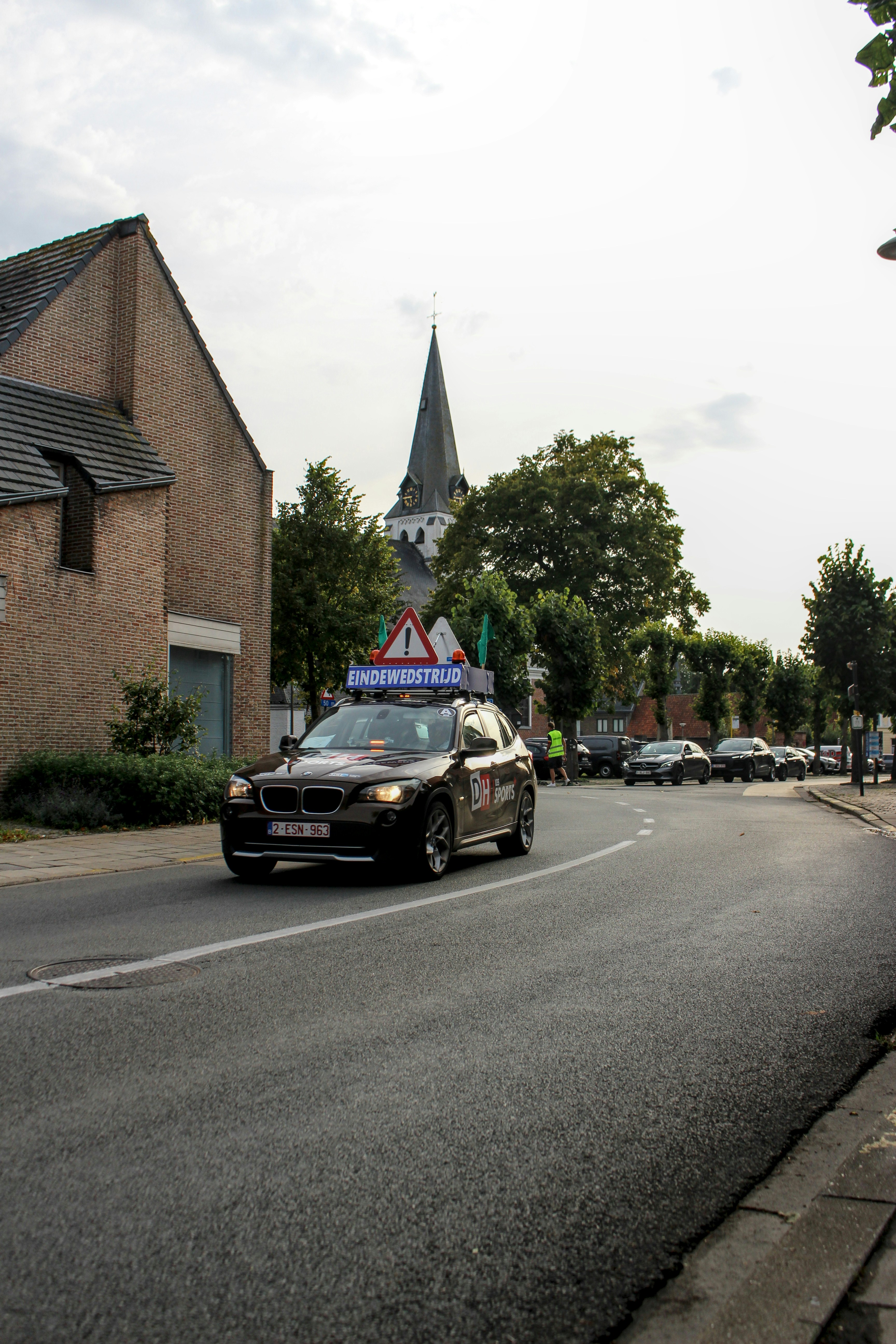 Car with driving school signs on a street