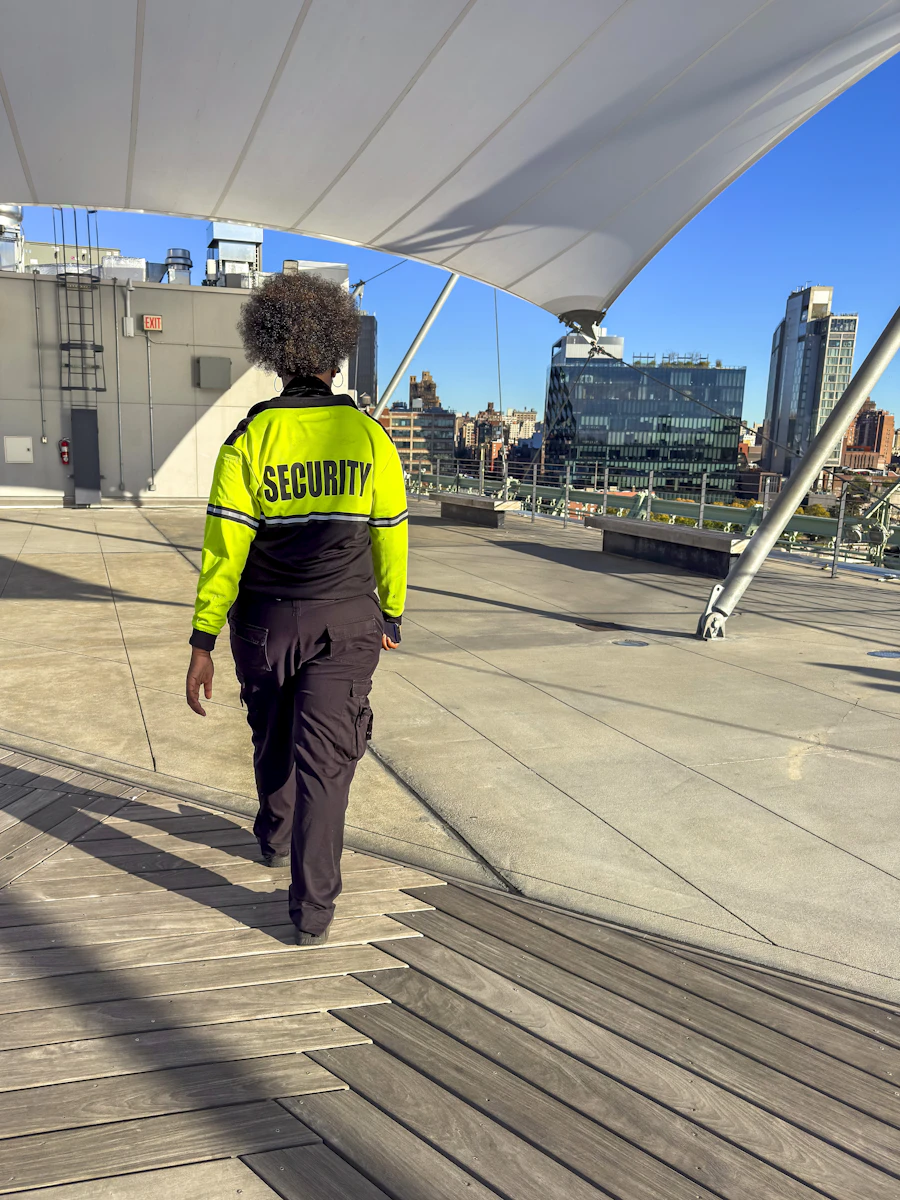 Security officer on patrol on a rooftop deck