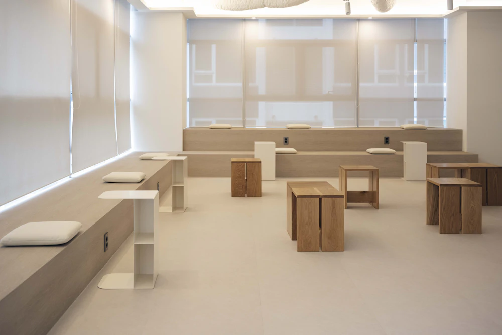 Calm, minimalist consultation seating area — placeholder, to be replaced with real clinic photography