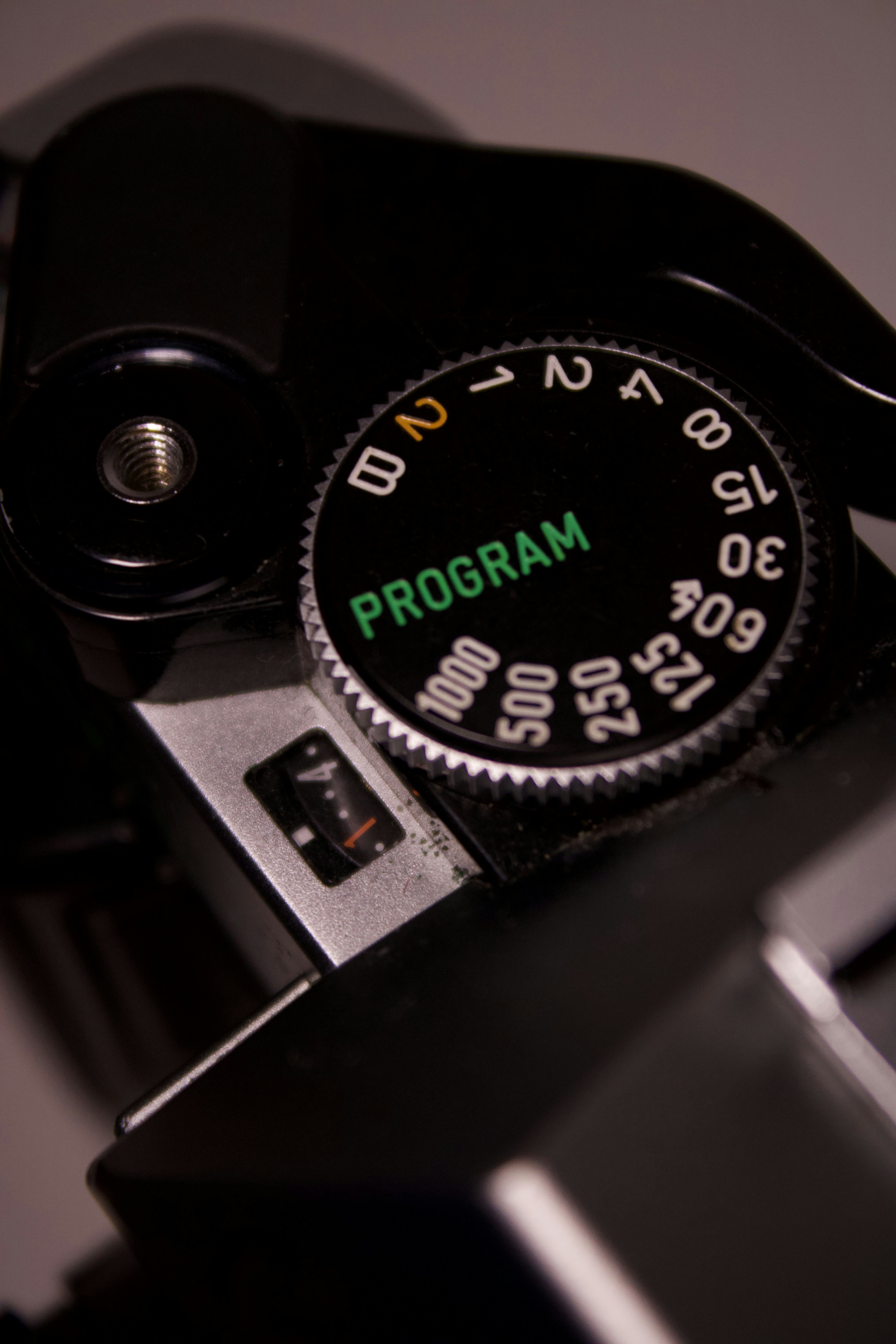 Nahaufnahme des Programmrads einer Kamera