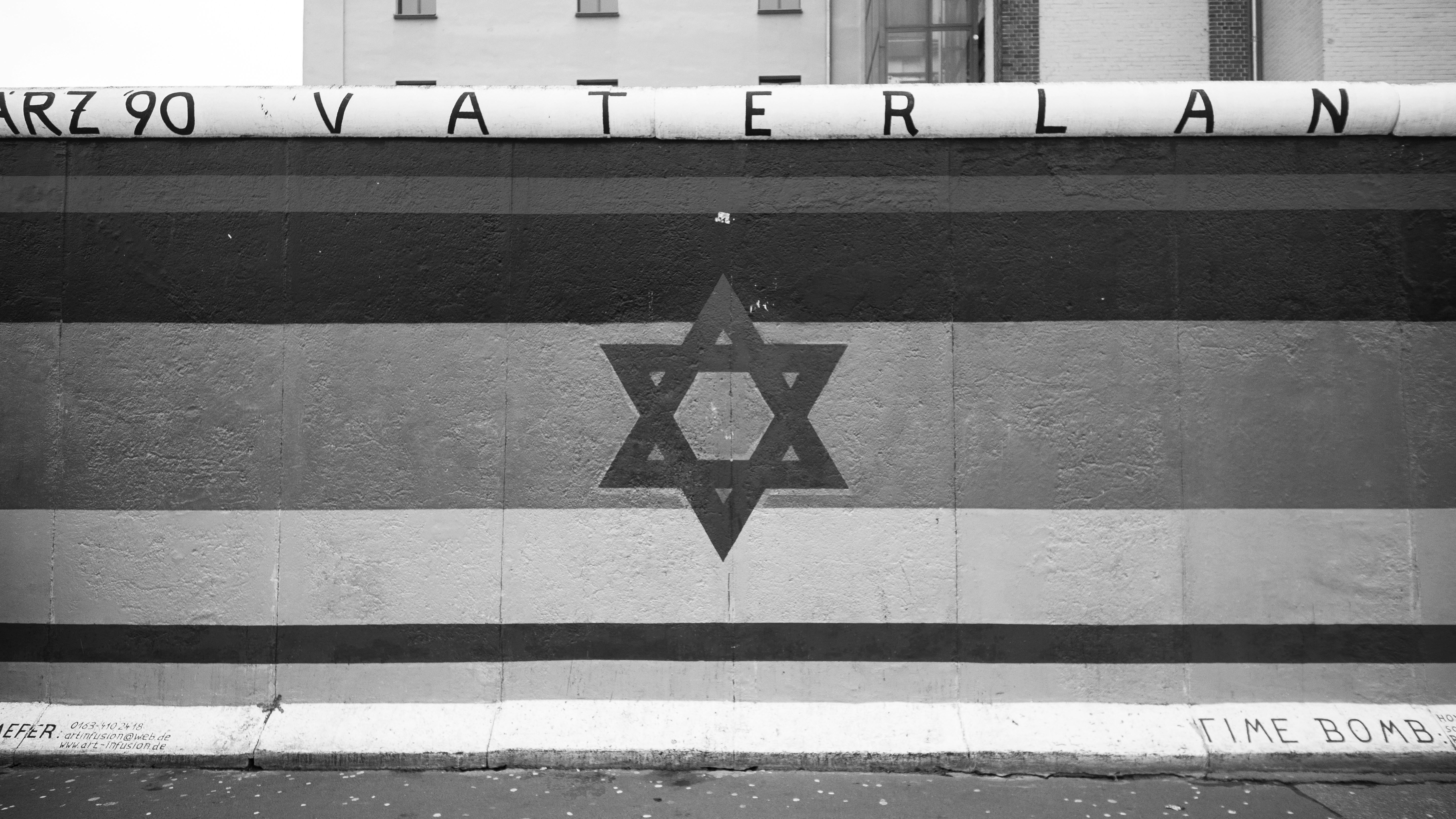 Star of david painted on striped wall