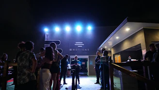 People gathered outside a nightclub at night