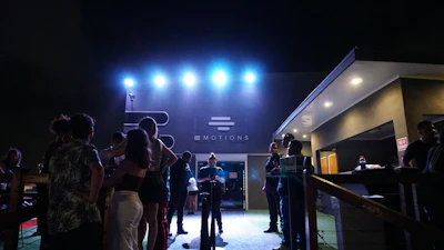 People gathered outside a nightclub at night