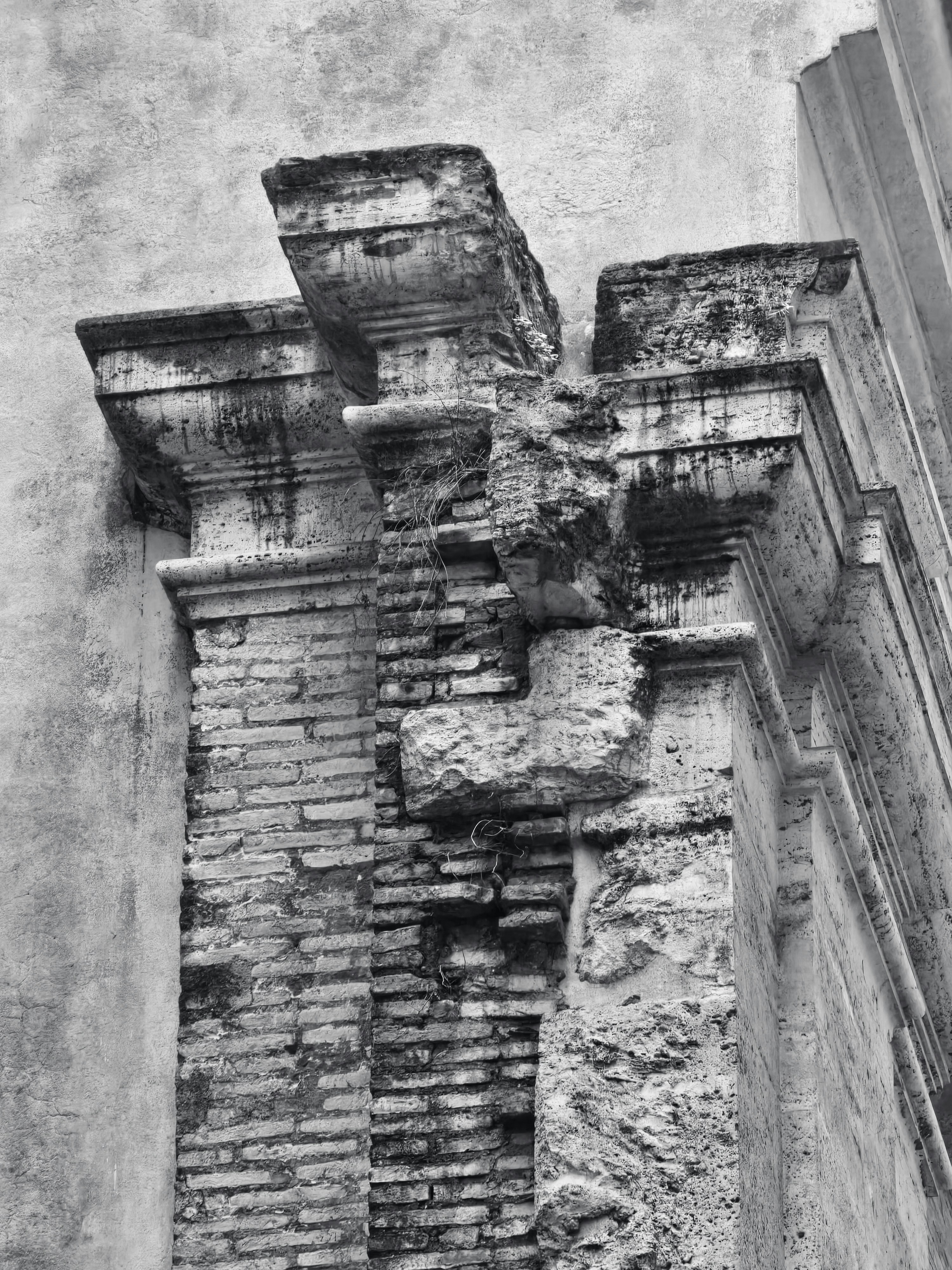 Close-up of weathered architectural details on a building.