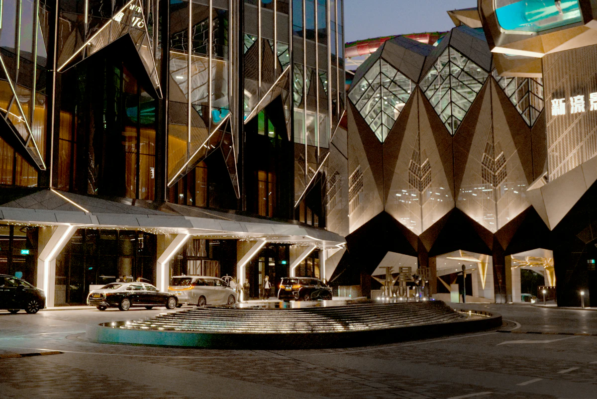 Cars at a Dubai hotel porte-cochere — where LuxeClub collects rental cars on departure mornings