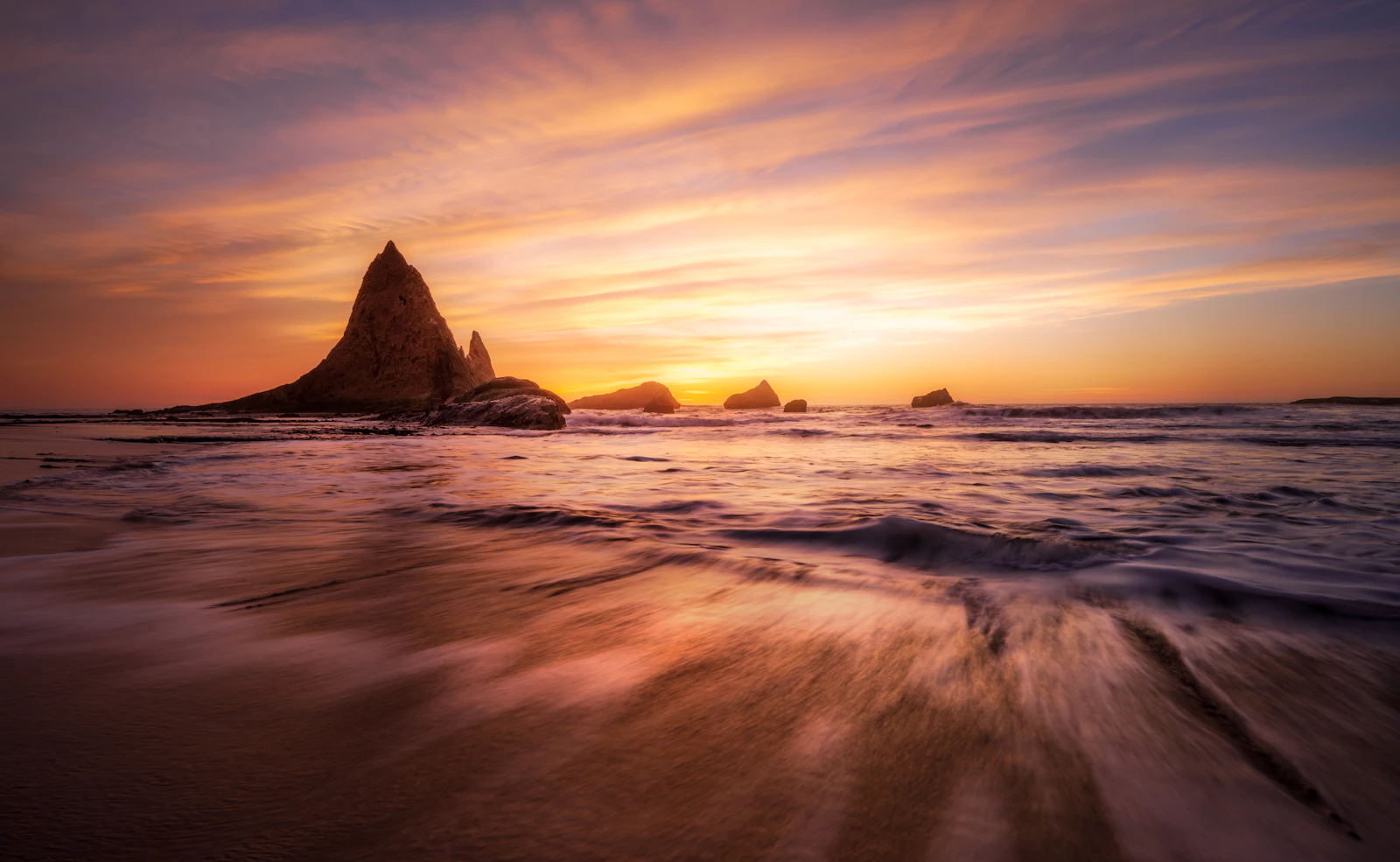 Sunset over sea stacks along Highway 1 near Big Sur