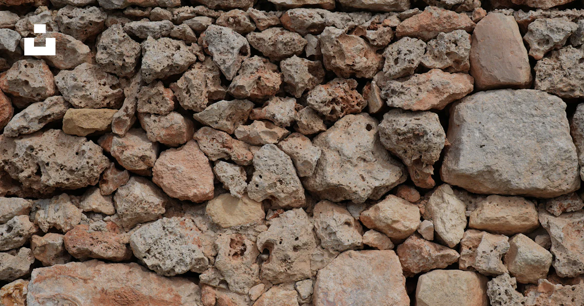Piedra Rugosa Muro de piedra de textura rugosa con tamaños variados foto – Imagen de ...