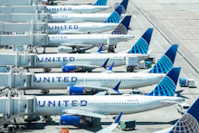 United Airlines jets parked at airport gates