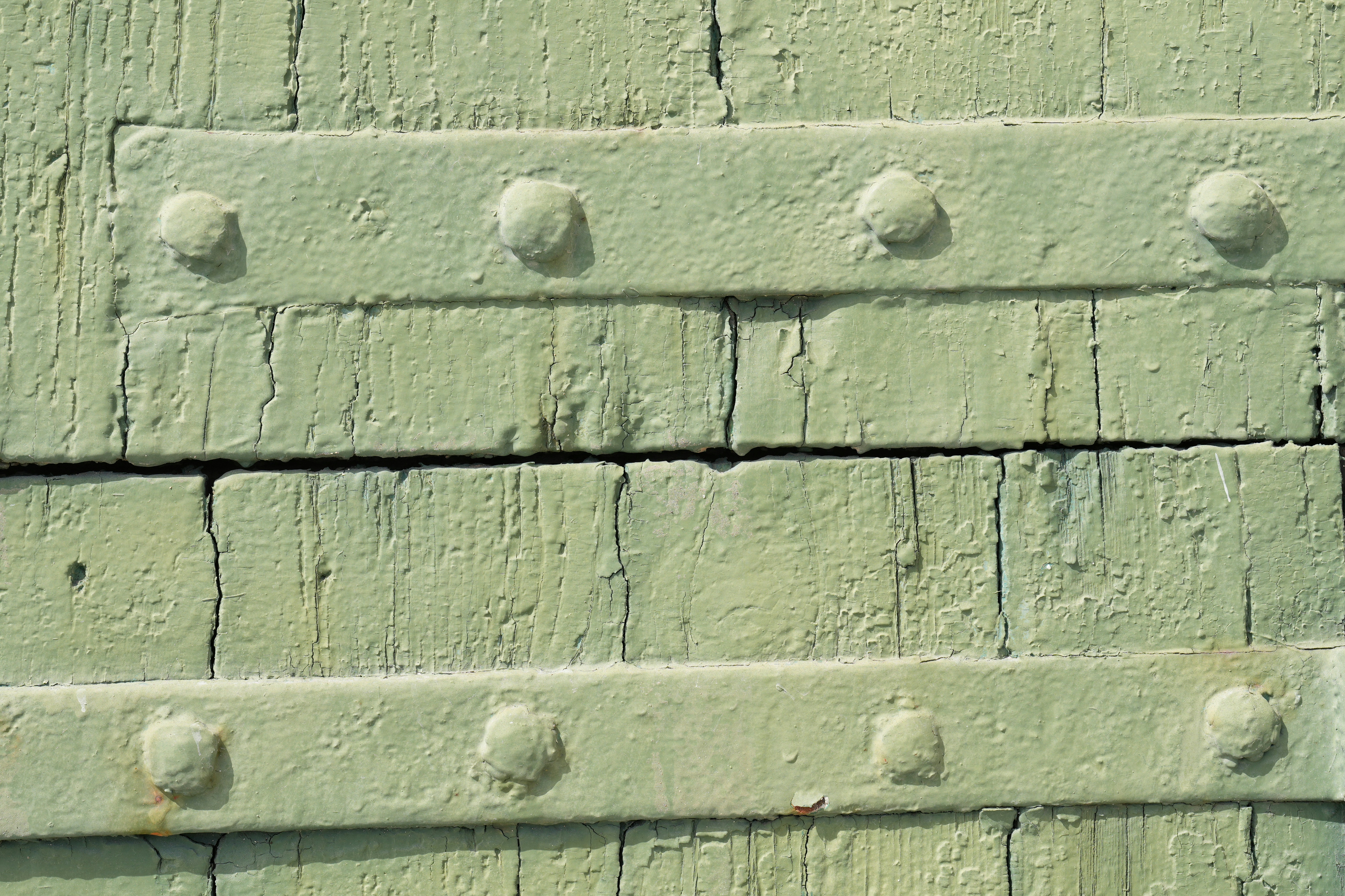 Weathered wooden planks with metal straps