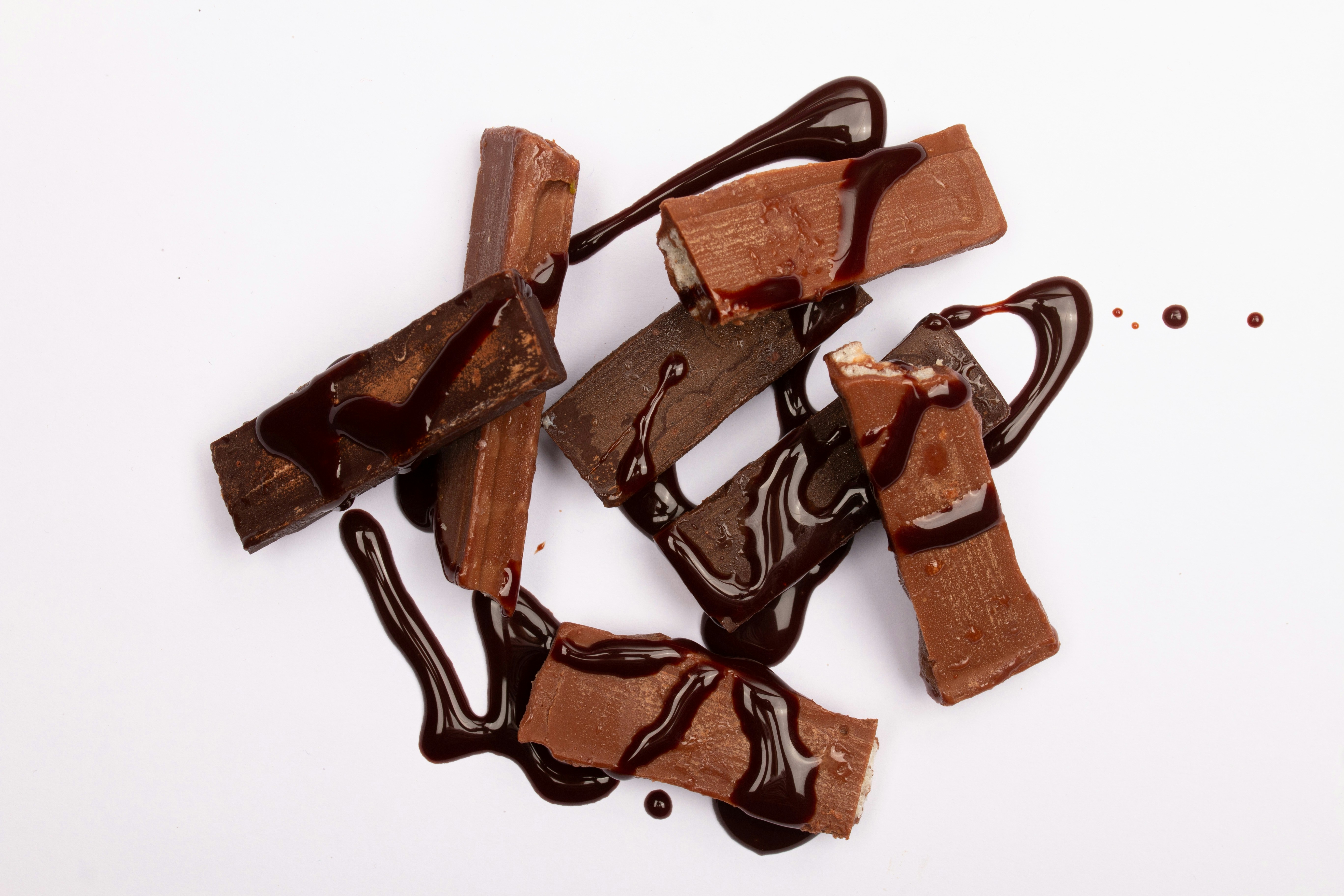 Chocolate bars drizzled with melted chocolate