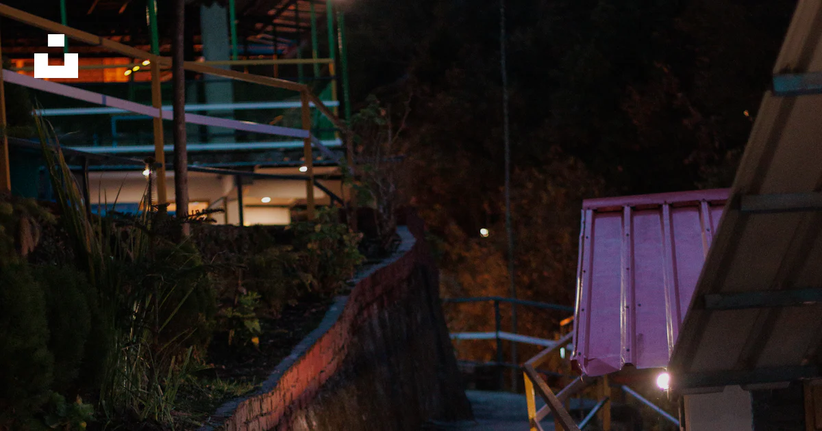 Dimly Pathway A dimly lit pathway with railings at night. photo – Free Night Image on ...