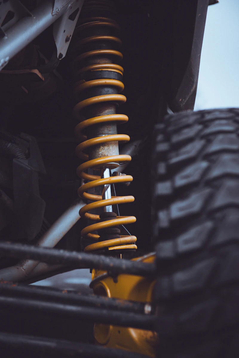 Componentes de suspensão automotiva