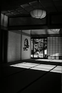 Sunlight streams into a traditional japanese room.