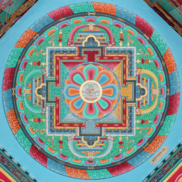 Intricate colorful mandala painted on a ceiling
