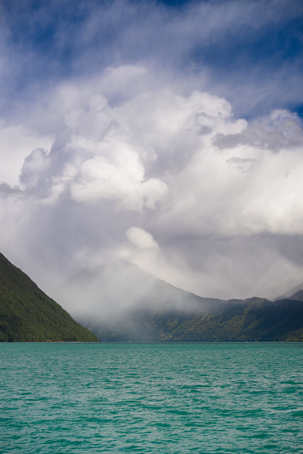 Azure waters and misty mountain forests of Basum Tso, Nyingchi