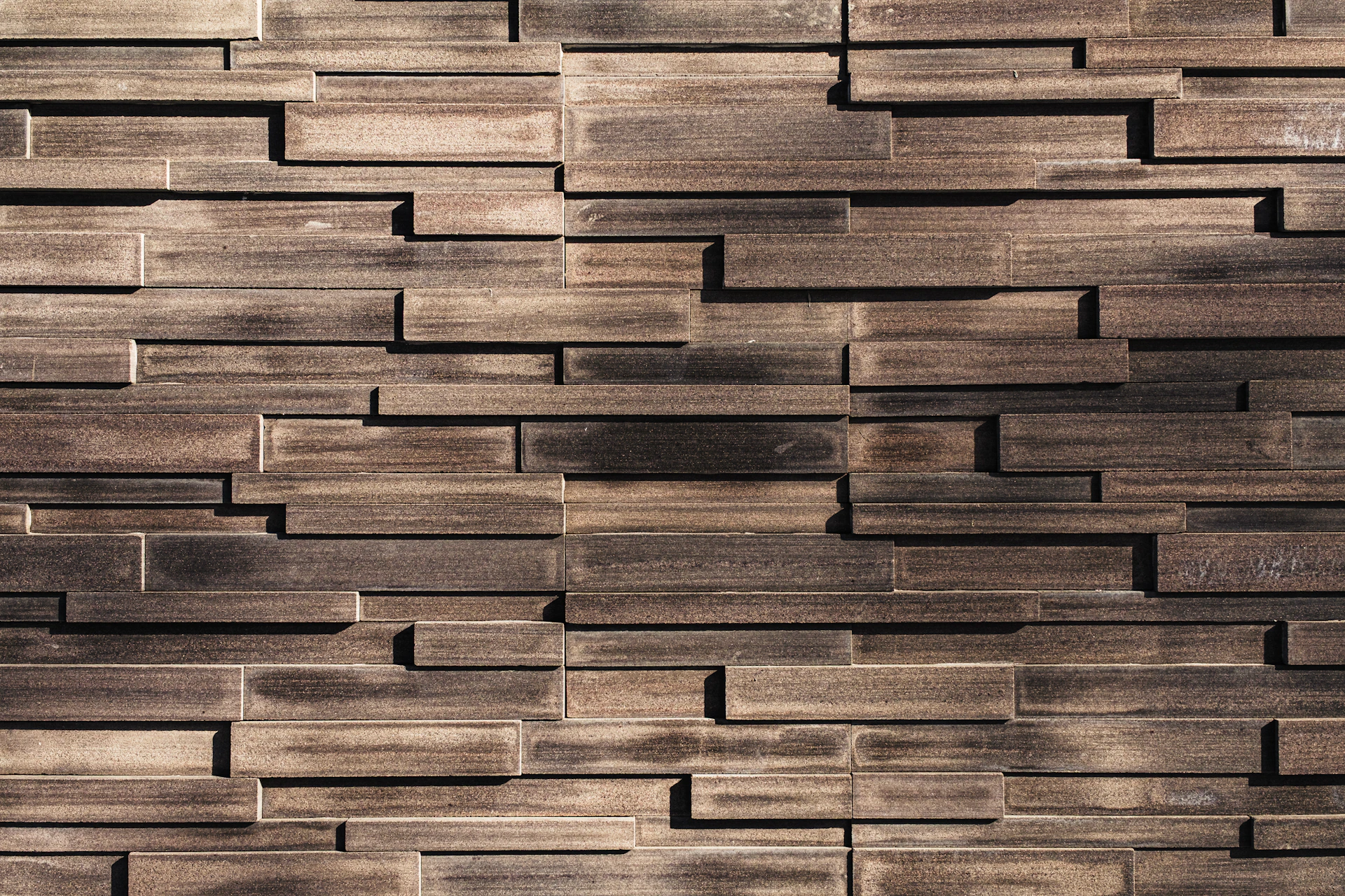 Textured brown and gray horizontal wall panels