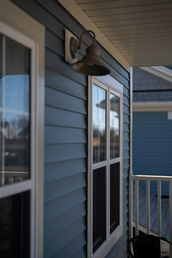 House with professional siding and white trim