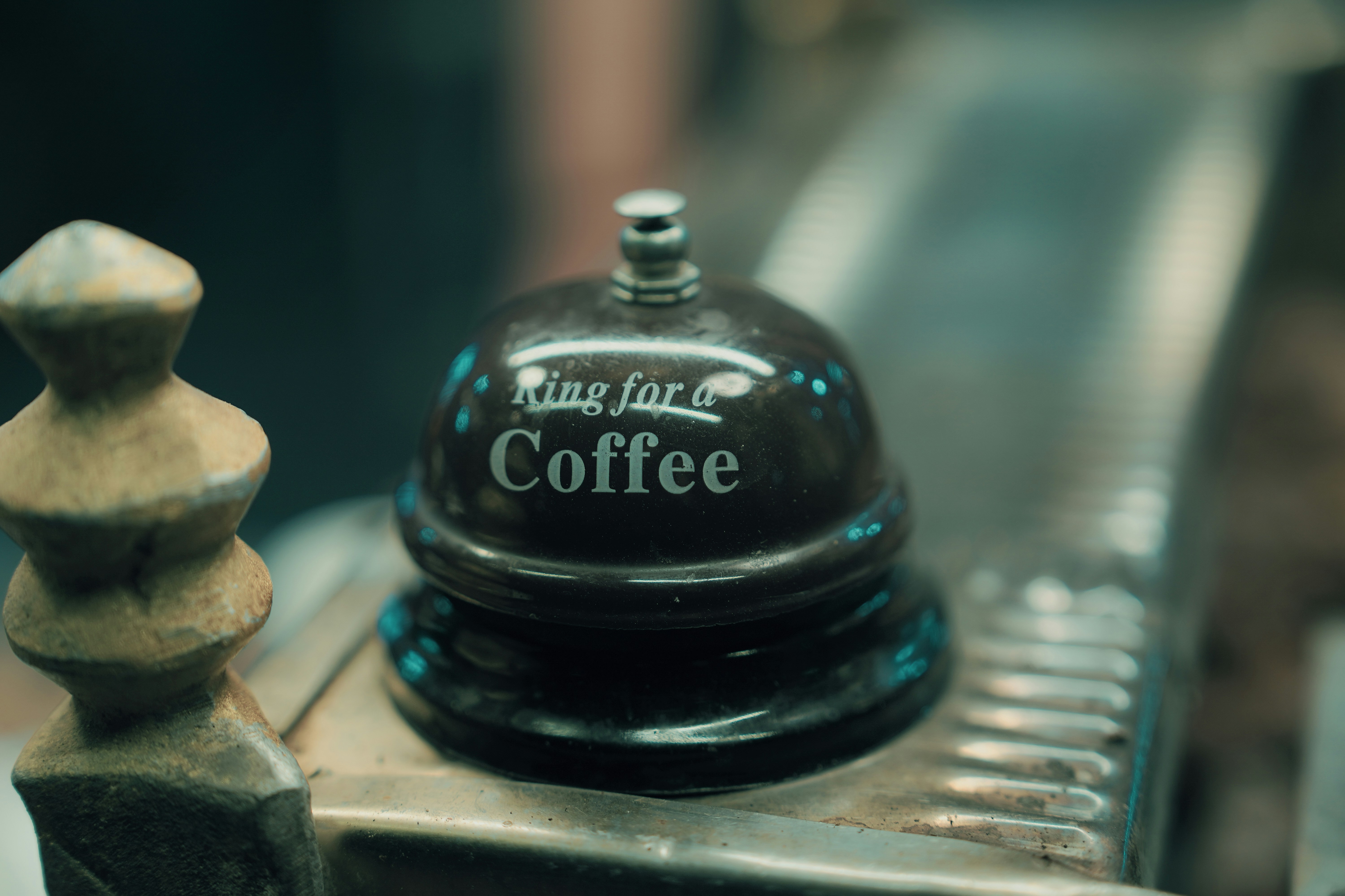 A vintage "ring for coffee" bell