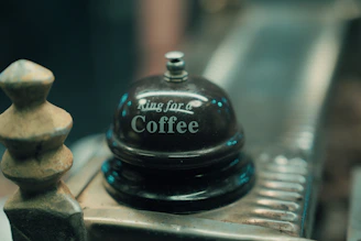 A vintage "ring for coffee" bell