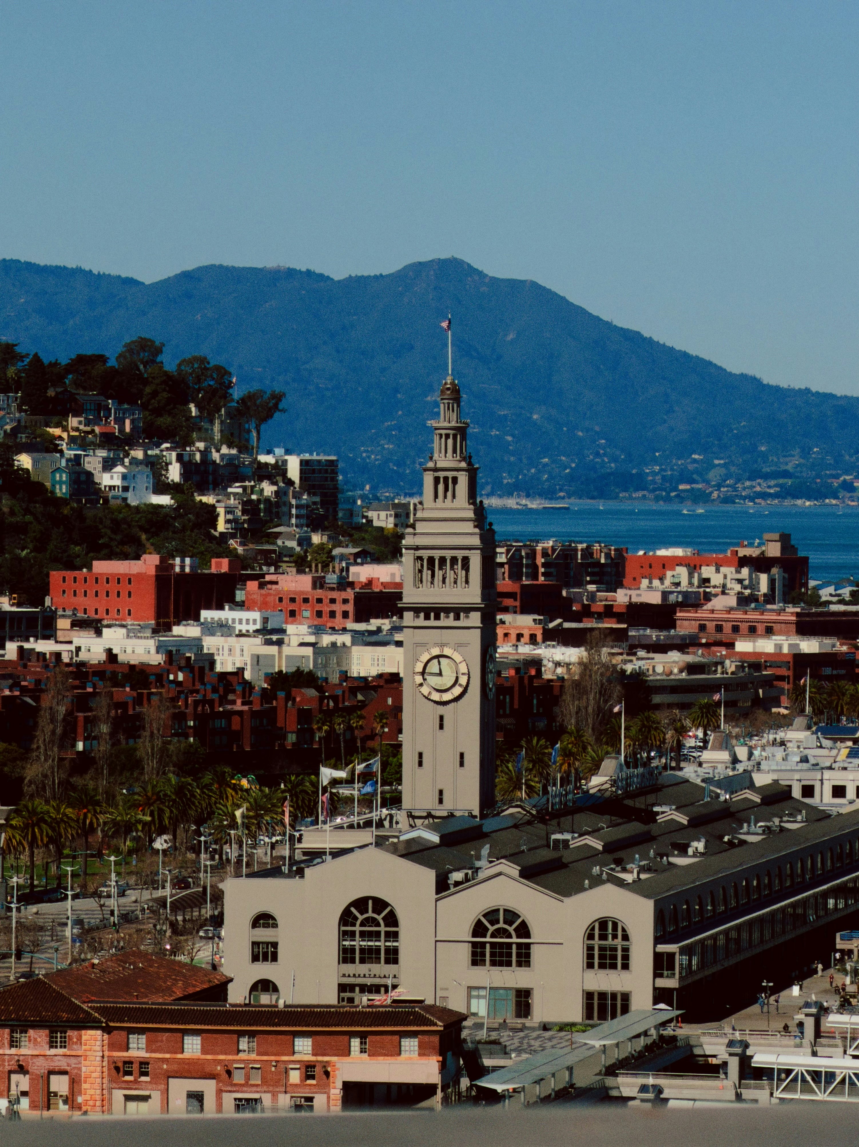 Ferry building with clock tower and cityscape