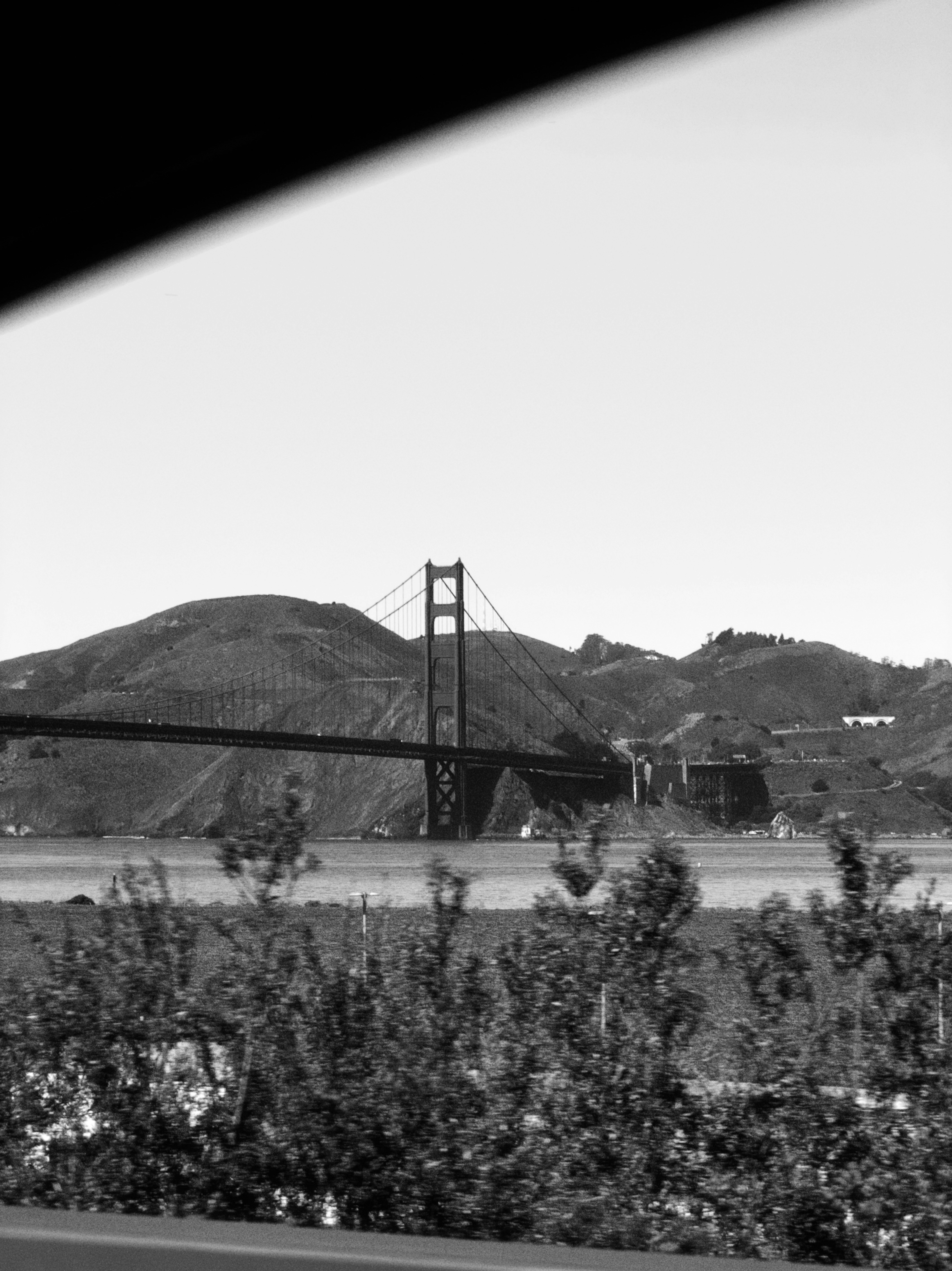 Golden gate bridge with hills in background