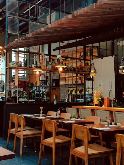 Cozy traditional restaurant interior with wooden tables and chairs
