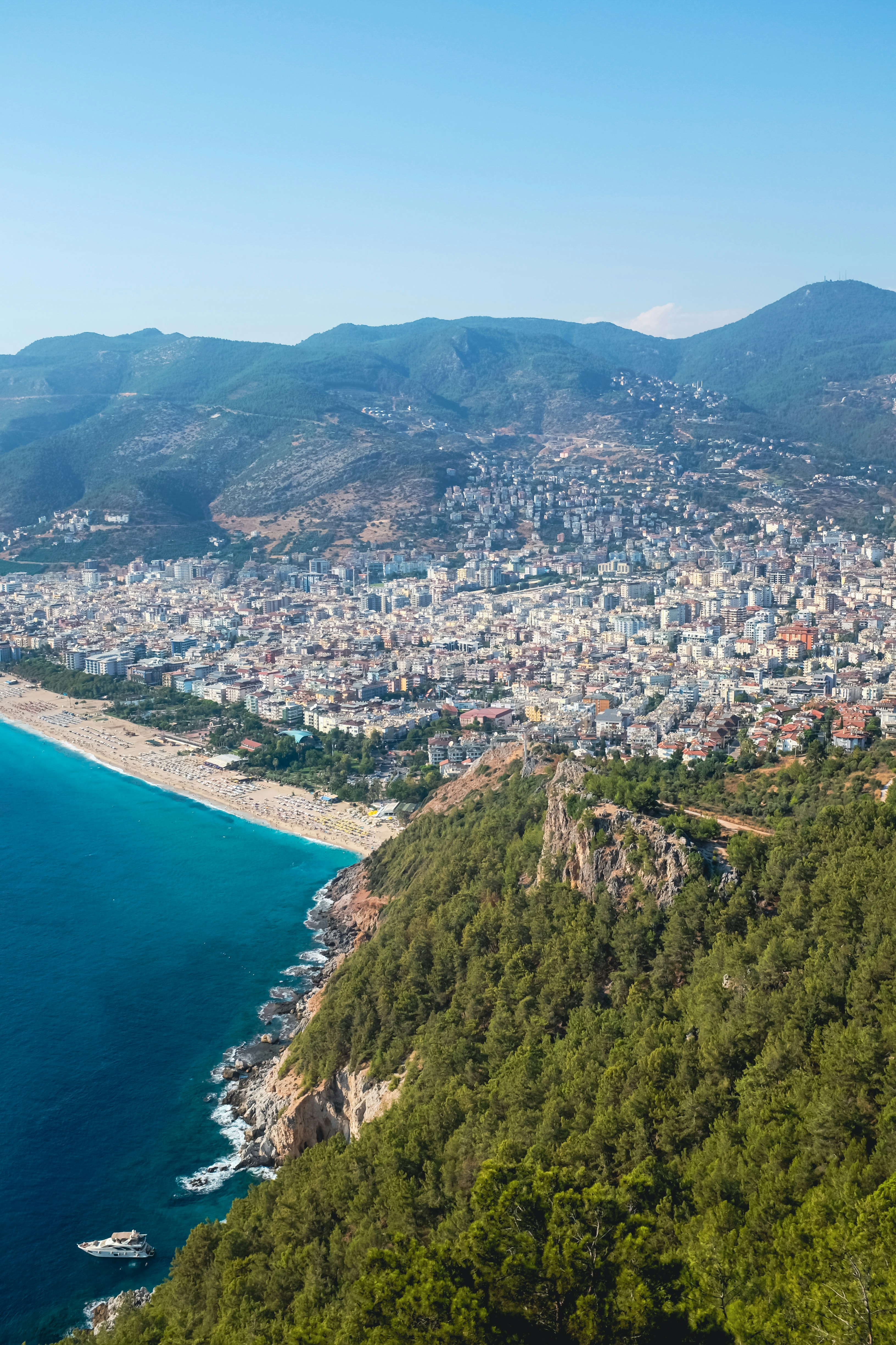 Coastal city with mountains and blue ocean