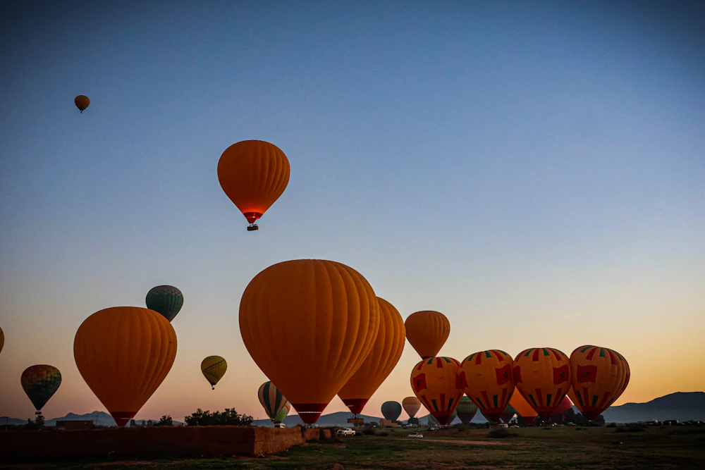 Hot air balloons preparing for flight in Marrakech