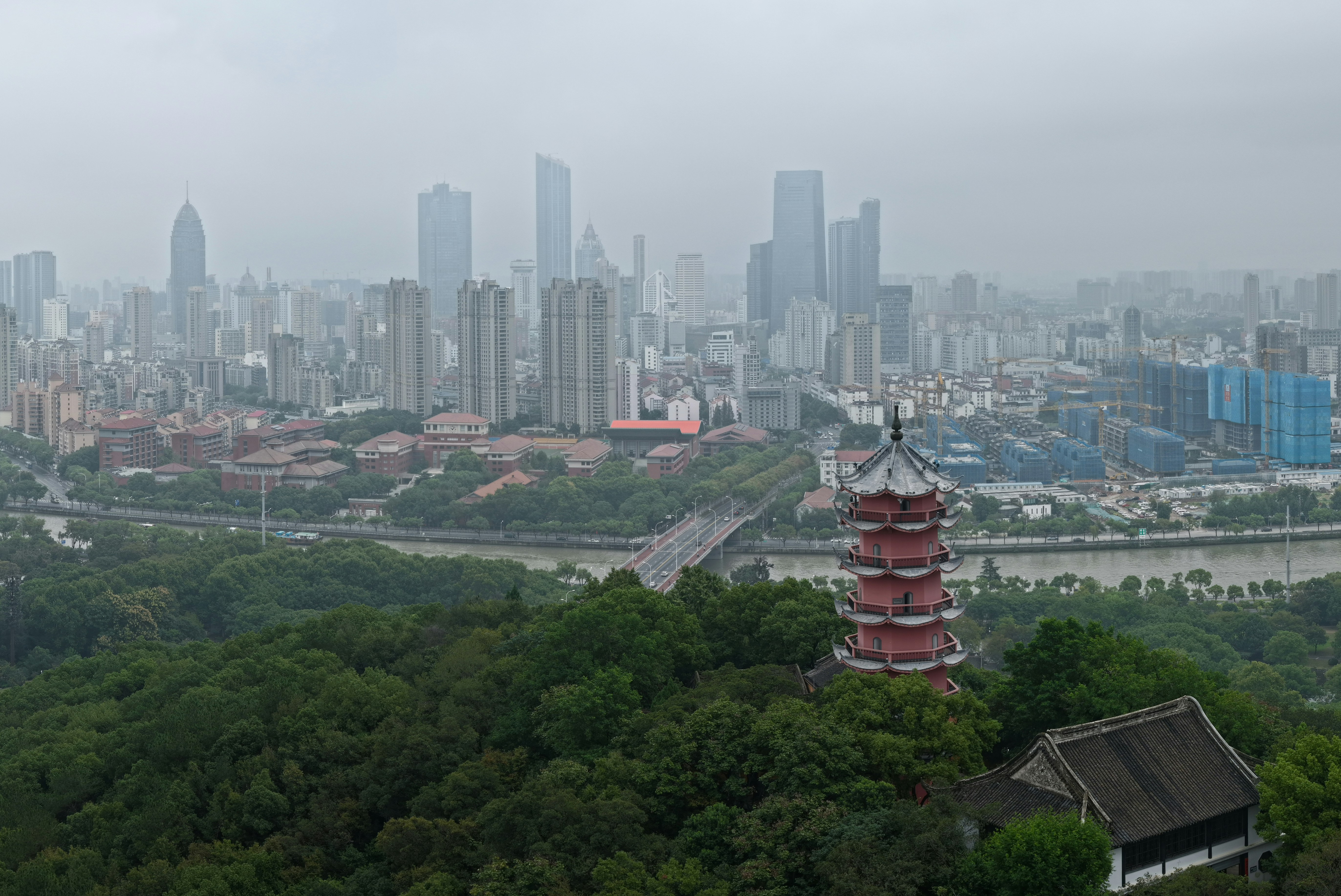Pagoda and cityscape on a hazy day