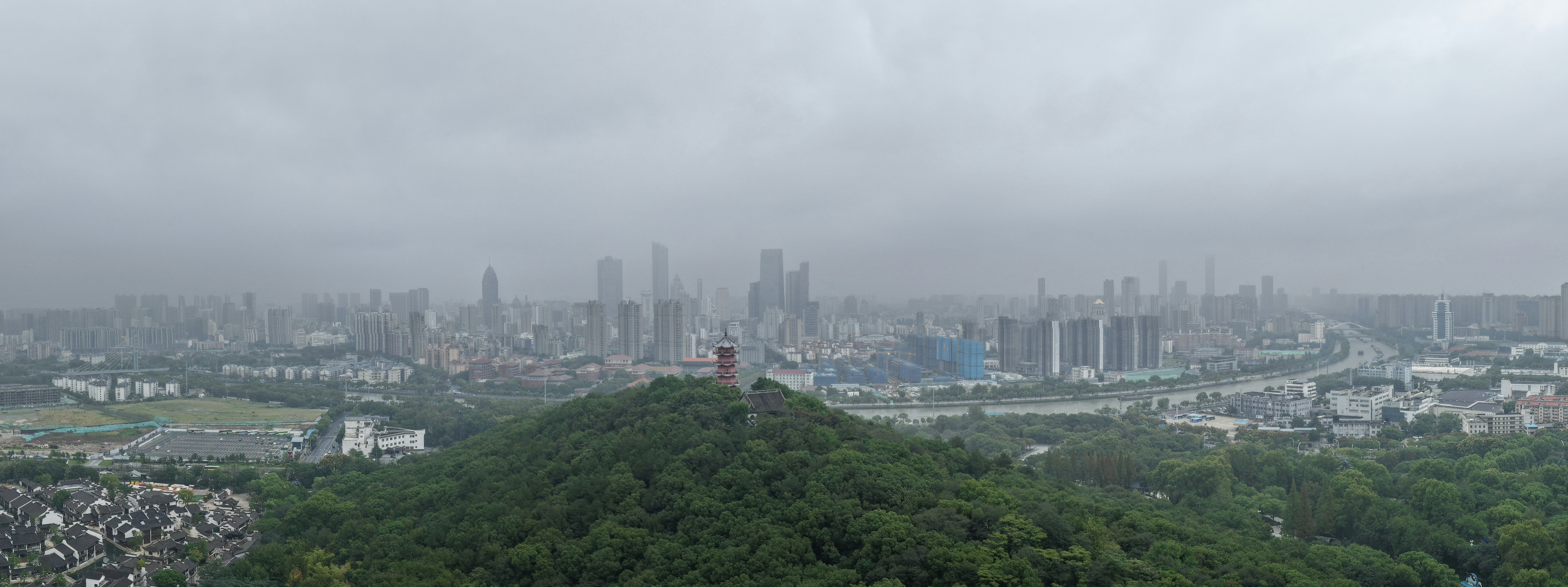 City skyline on a hazy, overcast day.