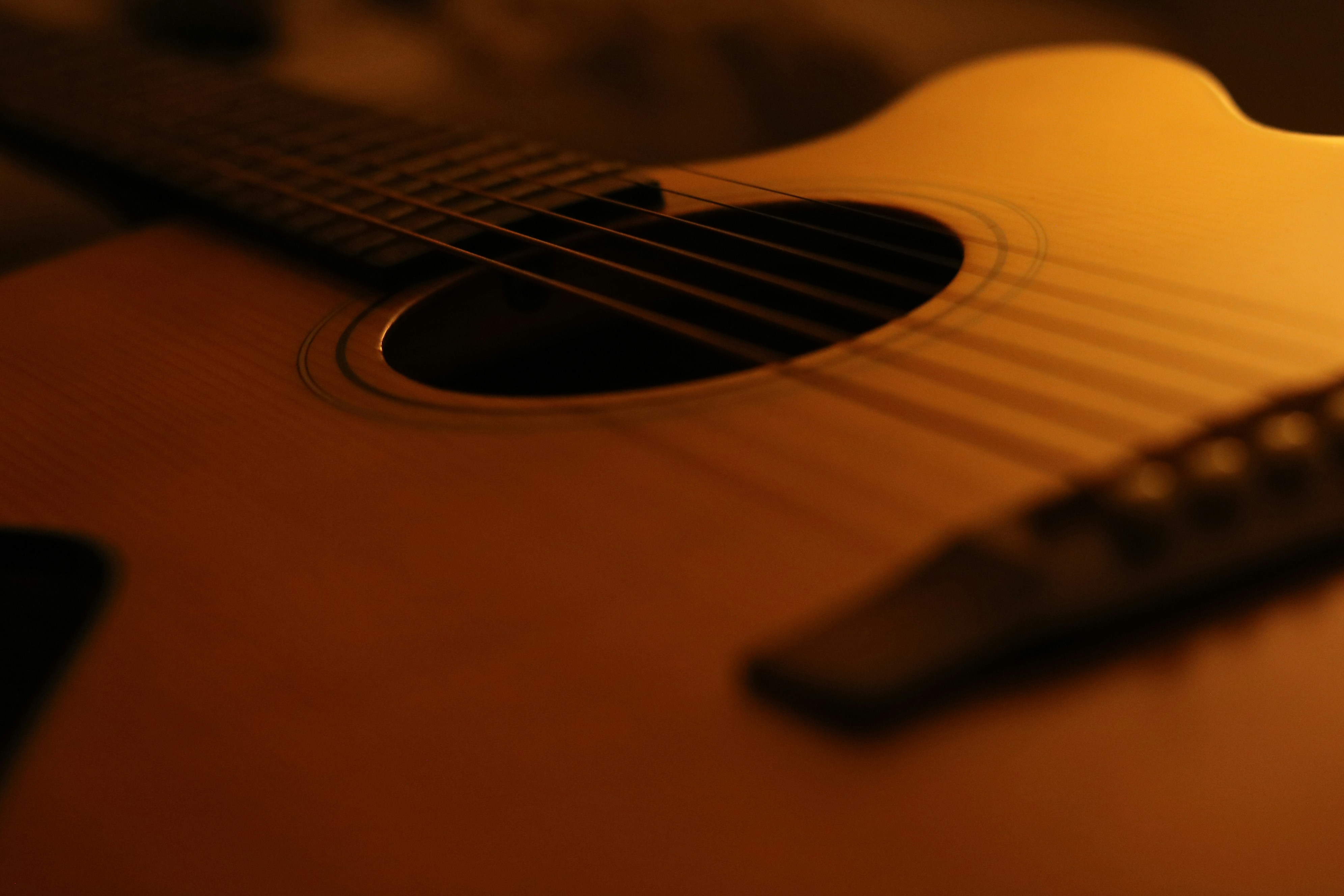 Student practicing acoustic guitar during a private guitar lesson in Lane Cove Sydney