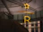 Neon star and letter r sign indoors