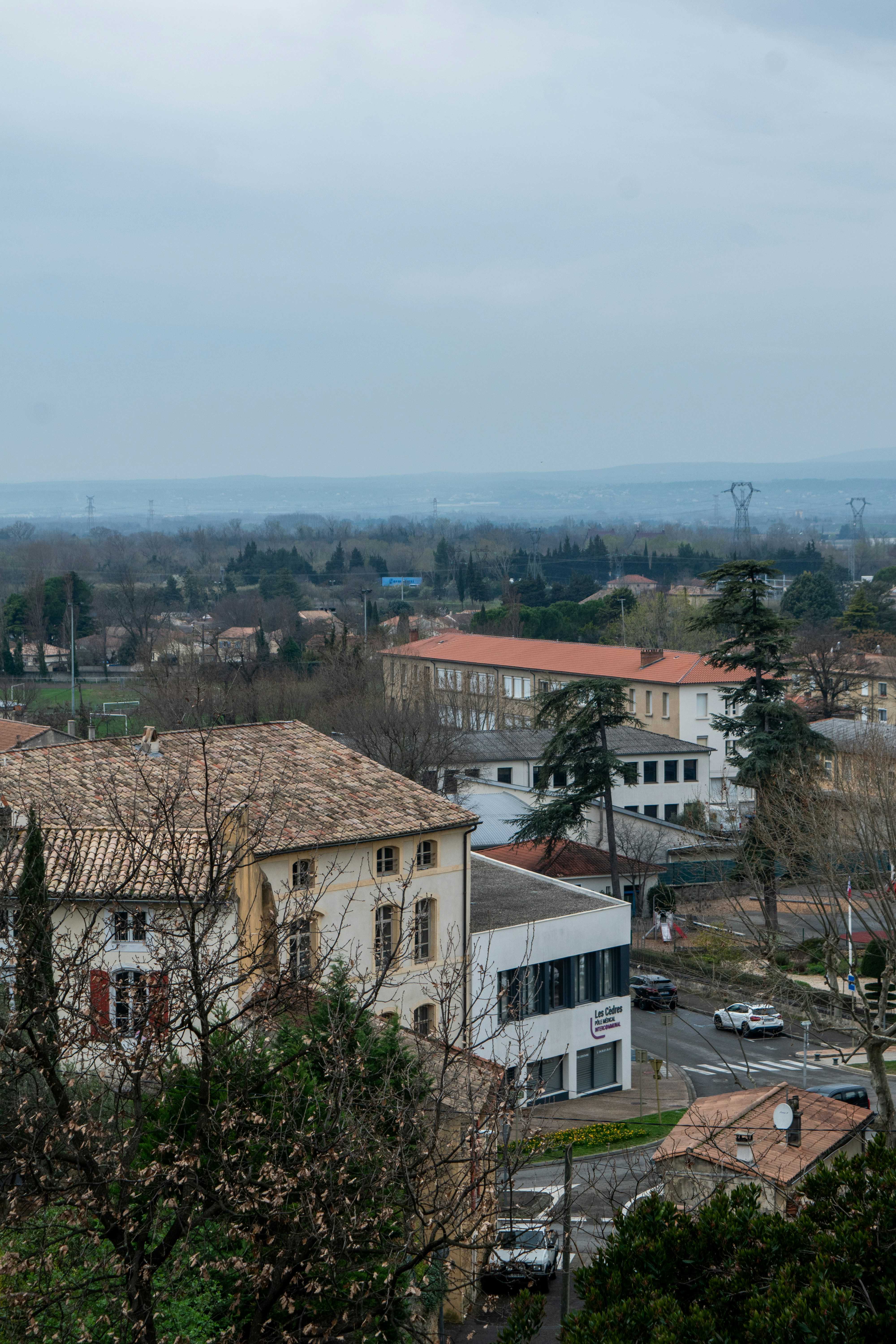 Overhead view of a european town with tiled roofs.