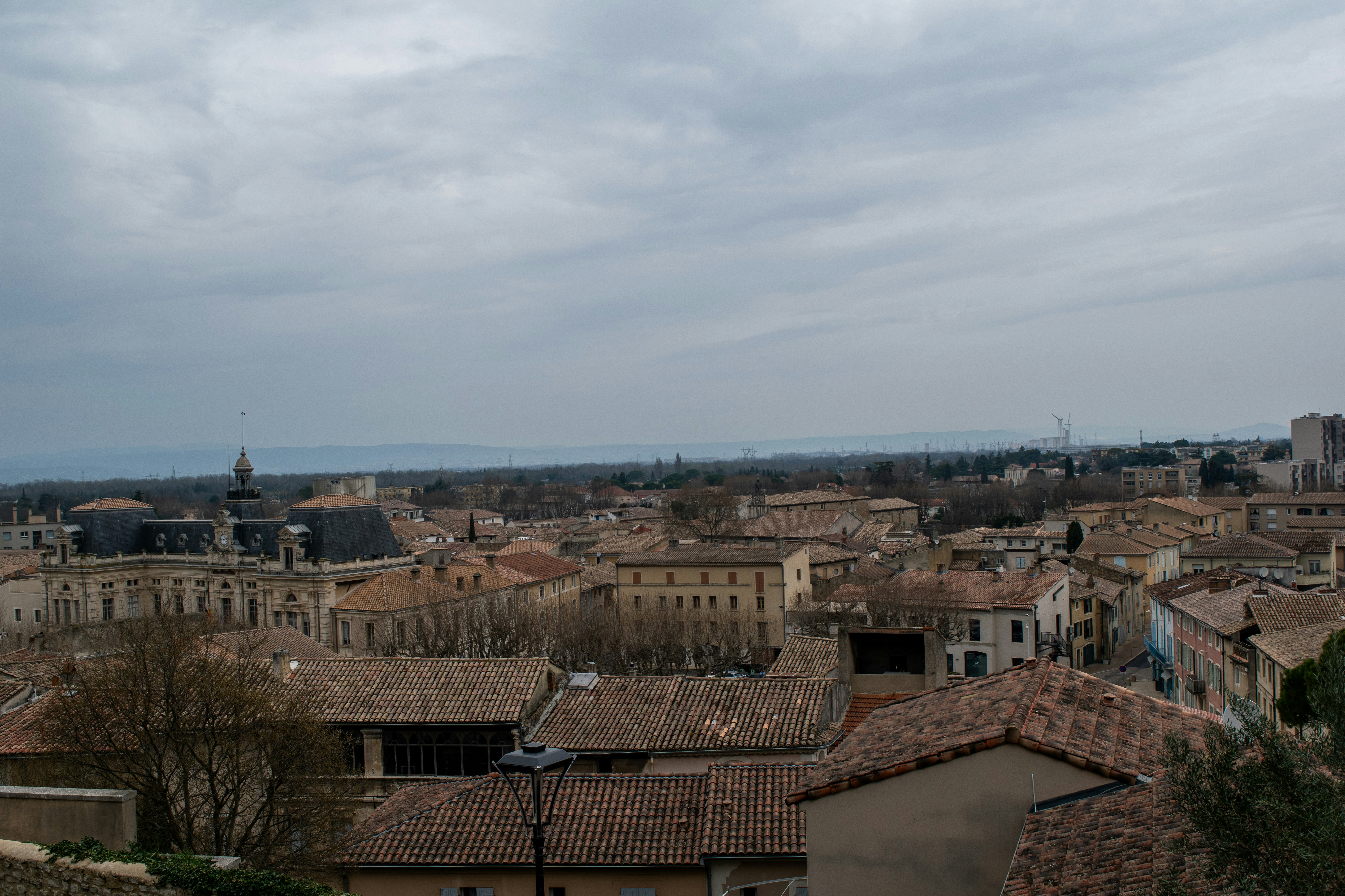 Rooftops of a european town under a cloudy sky