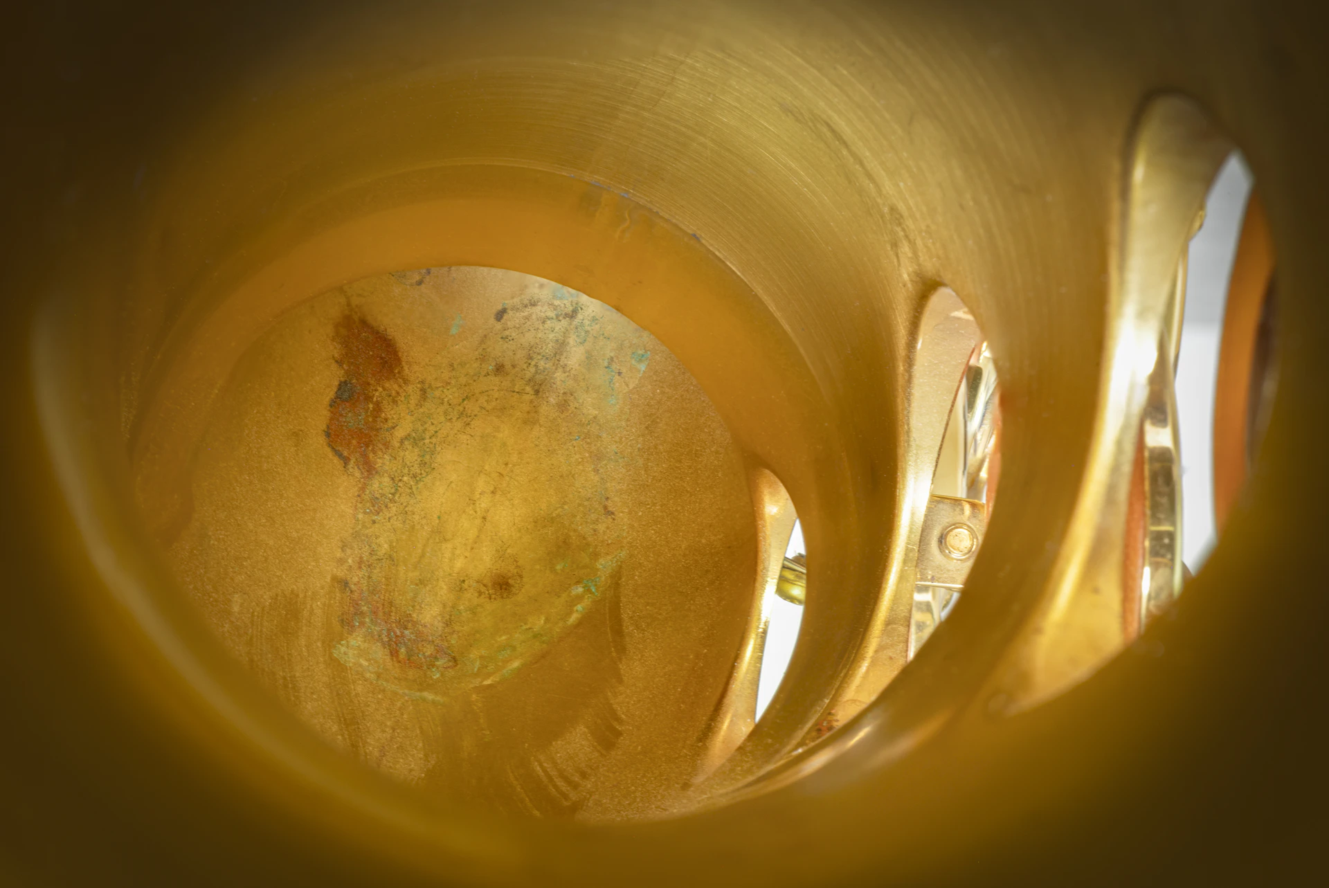 Abstract golden swirling tunnel with textured walls