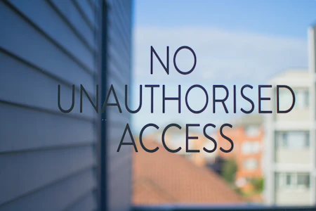 No unauthorised access sign on glass door