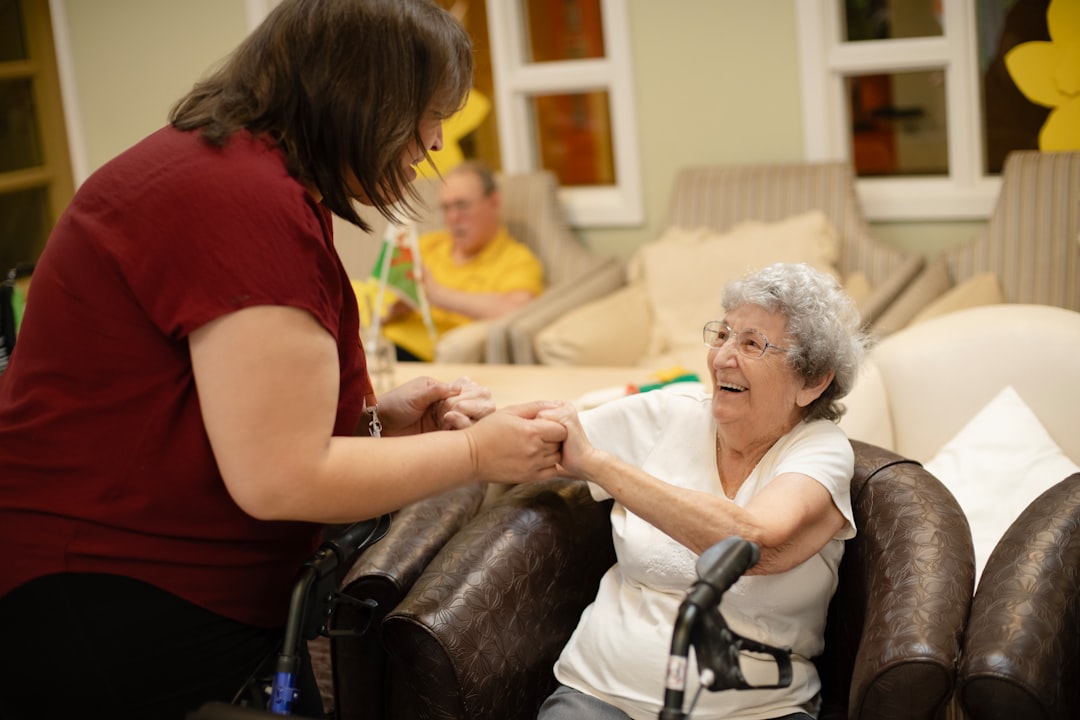 caregiver assisting an elderly woman in Pittsburgh home caregiver assisting an elderly woman in Pittsburgh home