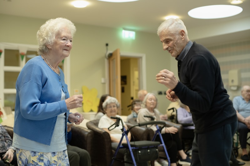 Close-up of a senior adult performing a chair exercise with proper posture, demonstrating safe seated movement